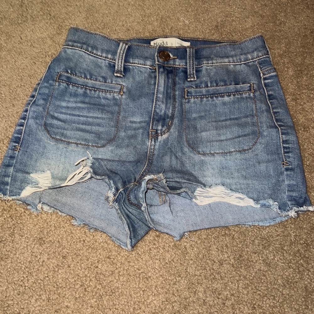 I am selling these blue distressed jeans shorts.